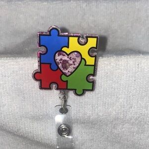 Colorful Puzzle Piece Badge Reel